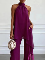 CLARA | Conjunto de top asimétrico con espalda descubierta y pantalones palazzo